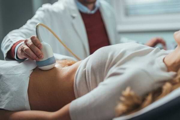 Doctor discussing bladder symptoms